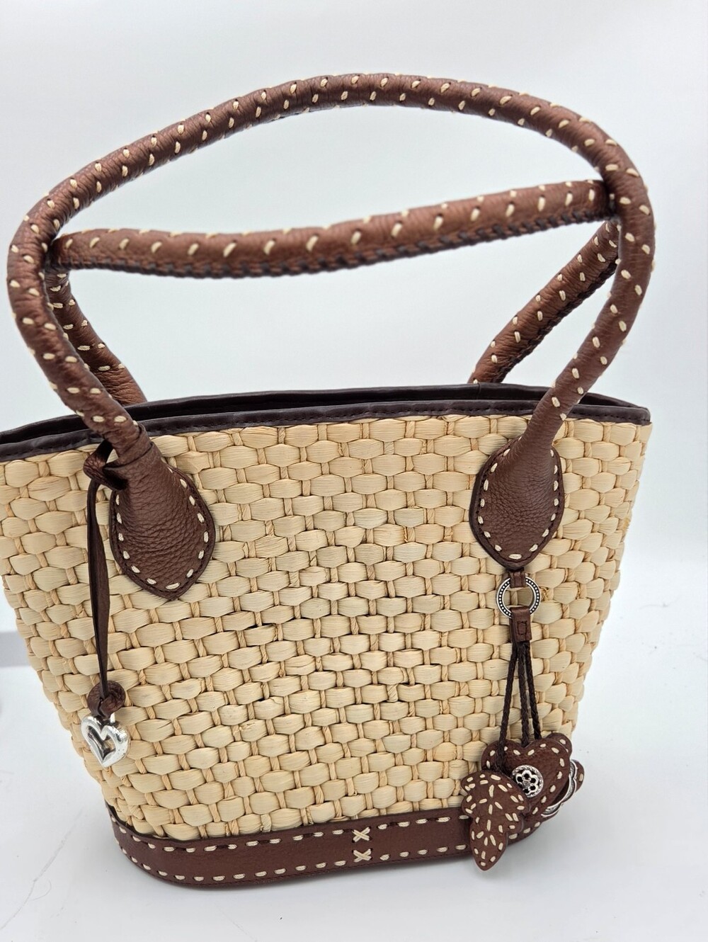BRIGHTON Heirloom Woven Straw Tote With Braided Leather Handles and Charms